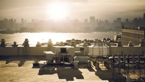 As the sun sets, a serene glow fills the skyline, illuminating industrial rooftops and the distant water. The city transforms under the golden light, creating a stunning visual. - Powered by Shutterstock - Get 15% off with code: PIKWIZARD15