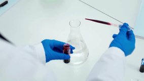 Red Food Dye Being Dropped into Water – Vivid Color Diffusion and Ink Swirl Effect in 4K Ultra HD - Powered by Shutterstock - Get 15% off with code: PIKWIZARD15