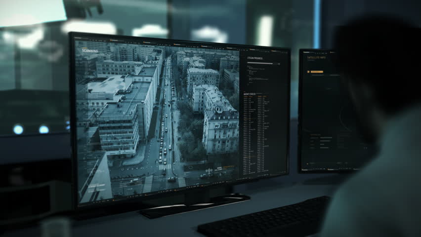 Hi-tech data analysis system is supervising the urban city. Hi-tech data analysis software looking for criminals. Hi-tech data analysis system locates the suspects in the car on the busy city road. UI