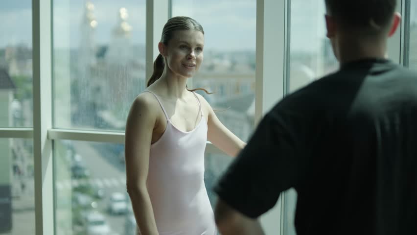 Female athlete and a male trainer working out in a modern gym. Activities include cardio training, weightlifting, consultations, and fitness assessments.