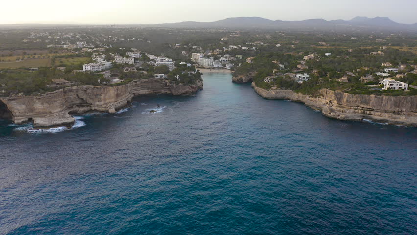 Aerial viewof the beautiful Cala Llombards and resorts, in the East side of Mallorca Island, Spain.