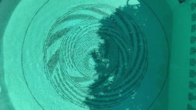 Top Down View of Round Pool - Powered by Shutterstock - Get 15% off with code: PIKWIZARD15