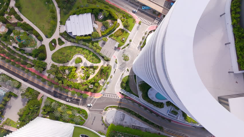 Aerial descent over a park. Drone facing directly down over a park. Canopy Park Miami South Beach