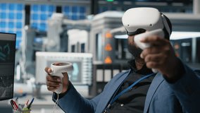 Photovoltaics manufacturing plant analyst works with VR gear to monitor system performance and the solar panels production line. African american expert uses virtual reality. Camera A. - Powered by Shutterstock - Get 15% off with code: PIKWIZARD15
