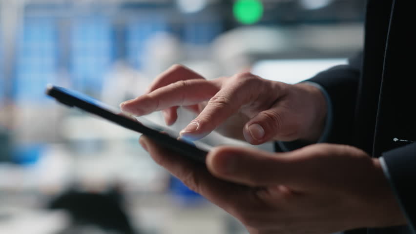 Building contractor managing solar production line in a high tech facility, ensuring sustainability and efficiency in photovoltaics manufacturing systems. Corporate oversight. Camera A.