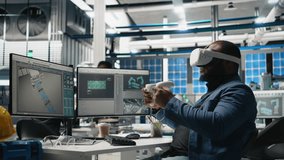 Black photovoltaics factory expert uses VR glasses to assembly digital solar cells, working with robotic arms for solar panels placement. Engineer uses machinery with virtual reality. Camera B. - Powered by Shutterstock - Get 15% off with code: PIKWIZARD15