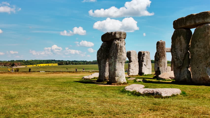 Prehistoric stone pillars and lintels form an iconic monument set on chalky ground at Stonehenge, Salisbury, Wiltshire, England, UK
