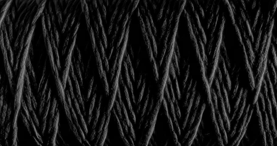 Seamless Woven Texture Background Loop. Texture of Dark rough twine. Video presenting a continuous dark gray woven thread texture, perfect for modern design applications	