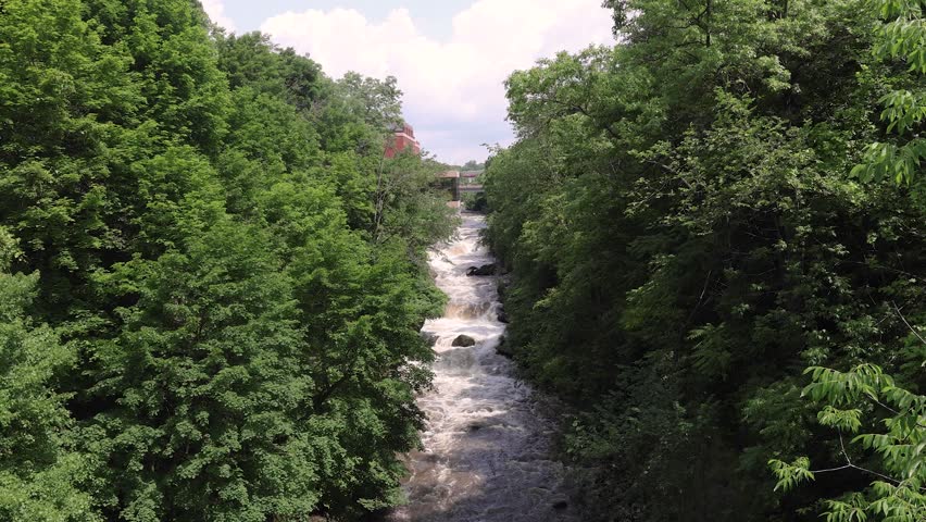 Whitewater rapids rush through the rocky gorge of the Cuyahoga River at High Bridge Glens in Summit County, Ohio — a restored natural escape near Akron and Cuyahoga Falls.