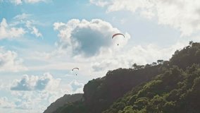 Paragliding Over Pandawa Beach, Bali – Aerial Adventure Above Tropical Cliffs and Ocean Bali, Indonesia 4K Aerial view - Powered by Shutterstock - Get 15% off with code: PIKWIZARD15
