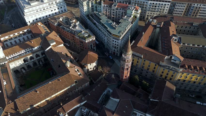 Aerial top down Milan downtown main square , warm afternoon light on old gothic architecture European city