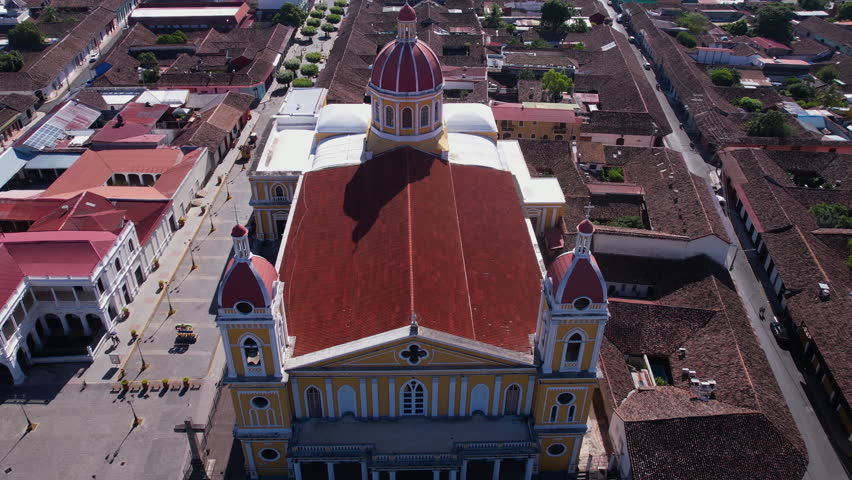 Granada, Nicaragua. Drone Shot of Central Cathedral and Park, Revealing Lake Nicaragua Coast