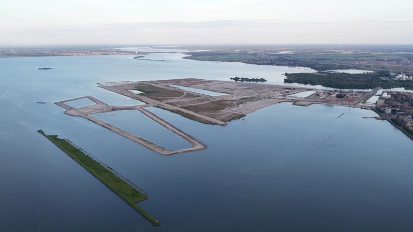 Middeneiland, Strandeiland, at Ijburg, Amsterdam, new build artificial island for residential purpose, still under construction. Aerial drone video.