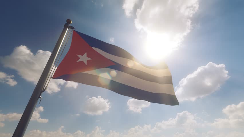Cuba Flag waving on a Flagpole with a cloudy blue sky background