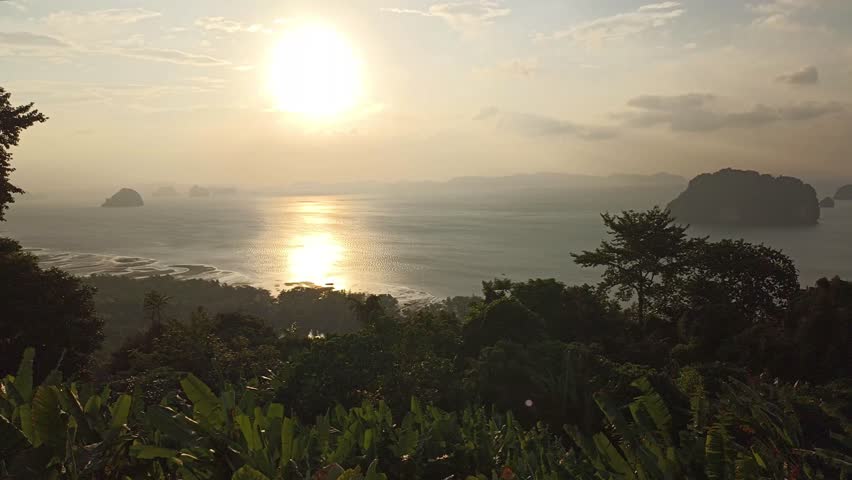 sunset sun light at island sea ocean view. holiday vacation seascape in Thailand.
