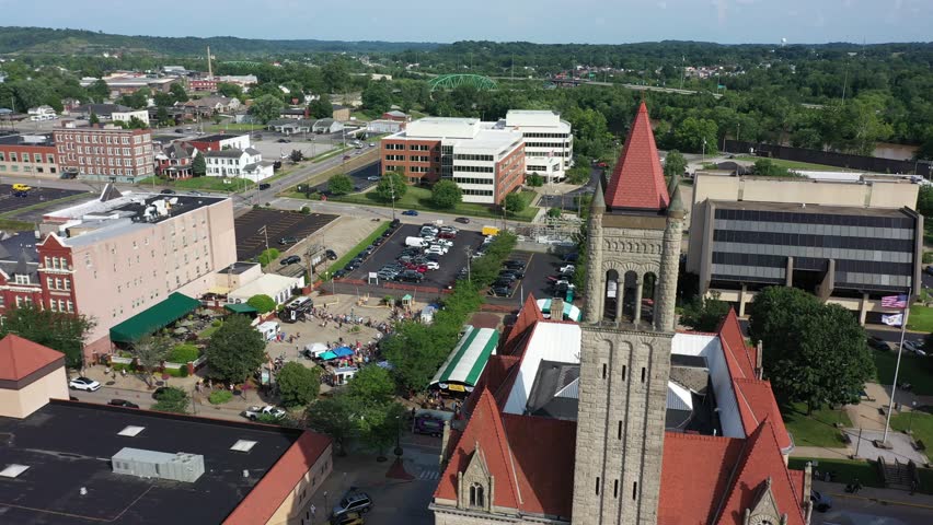 Explore the aerial perspective of downtown Parkersburg, West Virginia, highlighting its historic architecture and bustling streets near the Ohio River.