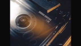 Vintage Audio Cassette Player with Retro VHS Effect - Nostalgic 80s 90s Tape, Classic Music Storage, Grainy Analog Video Style, Old School Audio Technology, Historical Media Aesthetic - Powered by Shutterstock - Get 15% off with code: PIKWIZARD15