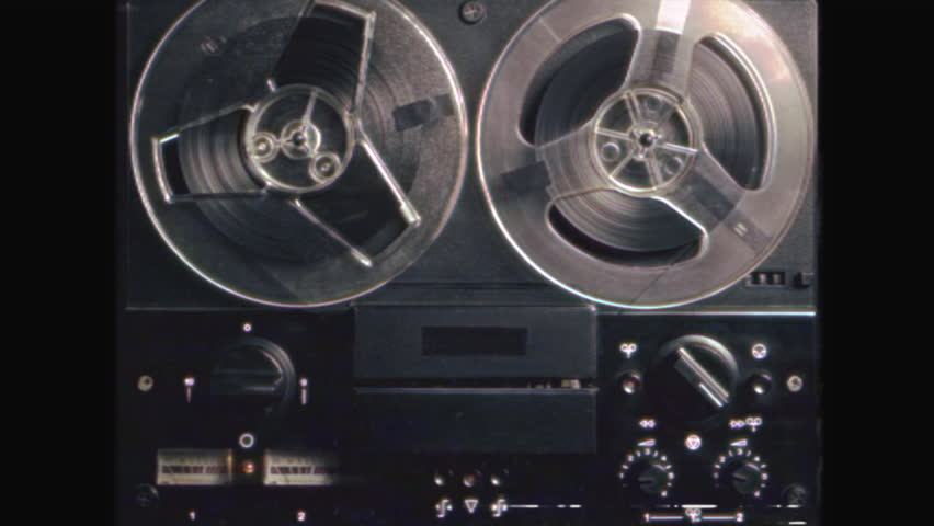 Vintage Reel-to-Reel Tape with Retro VHS Effect - Nostalgic 70s 80s Audio Recording and Film, Classic Analog Technology, Grainy Video Style, Old School Cinema and Sound Equipment Aesthetic