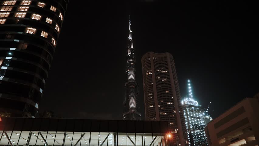 night view of the beautiful city of dubai in the united arab emirates. Downtown and skyscrapers of the business center in the evening. Burj Khalifa. Islamic culture and travel