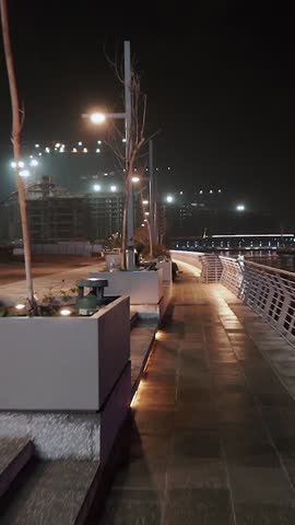 night view of dubai in the united arab emirates. Downtown, waterfall, river, gulf, skyscrapers of the business center in the evening. Islamic culture and travel
