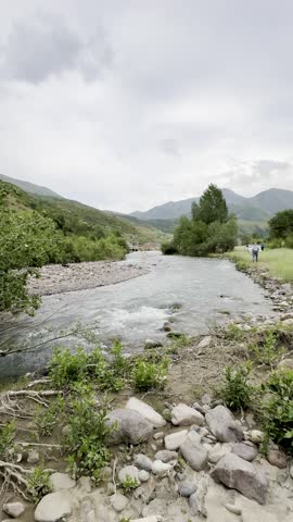 Serene River Flowing Through Natural Landscape – Peaceful Water in Wild Nature