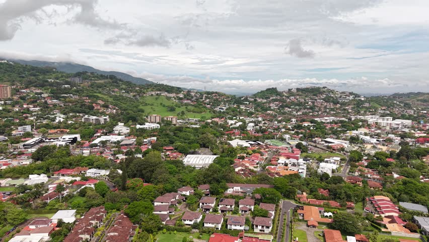 Aerial video of San Jose Capital city of Costa Rica during day light