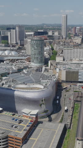 Vertical establishing aerial view of the skyline of Birmingham, city in England, United Kingdom.