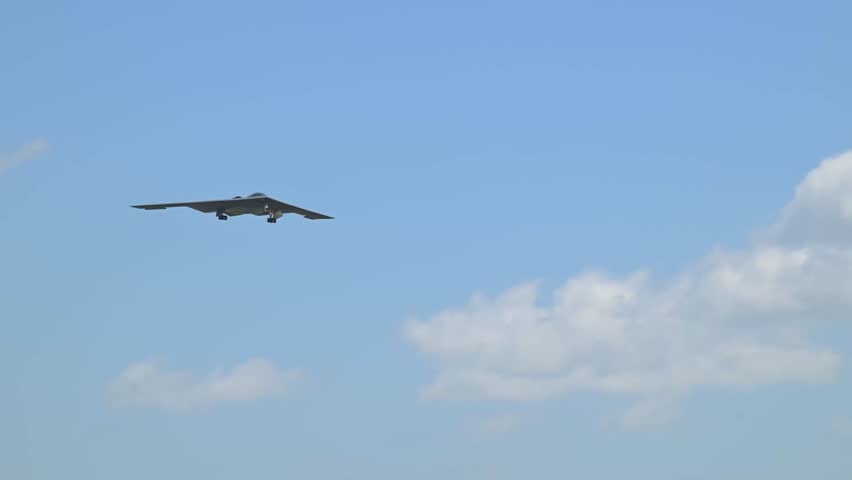 The B-2 Spirit bomber landing after flying in combat formation.