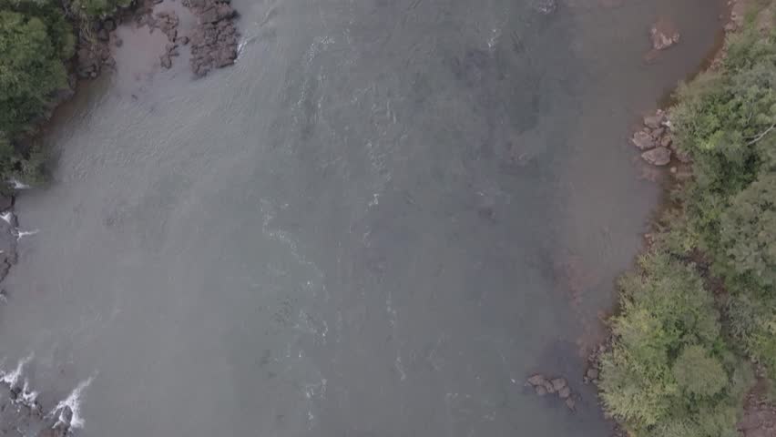 Drone aerial view of the Iguazu Falls, on the border between Argentina and Brazil. Located in the Iguazu National Park, it is considered one of the seven wonders of the world