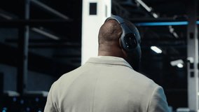 Software developer in data center workspace coding on tablet, analyzing metrics, optimizing storage volumes. IT specialist in server room using device, ensuring seamless operations, camera B - Powered by Shutterstock - Get 15% off with code: PIKWIZARD15