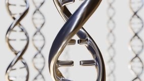 A 3d animation of rotating metallic DNA double helix, in the background, out of focus, are multiple other DNA double helix structures. - Powered by Shutterstock - Get 15% off with code: PIKWIZARD15