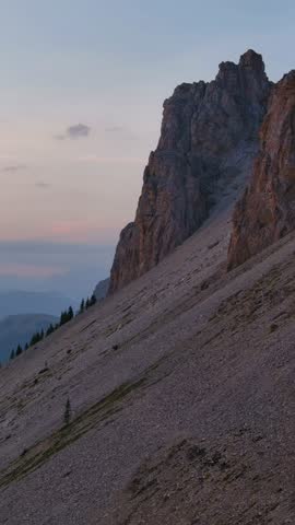 Peaceful Dusk Settles Over the Expansive Rocky Mountain Landscape in Alberta, Canada