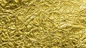 Luxury shiny metallic golden foil crumpled texture background stop motion - Powered by Shutterstock - Get 15% off with code: PIKWIZARD15