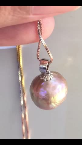Elegant Iridescent Baroque Pearl Pendant Hanging from Silver Chain