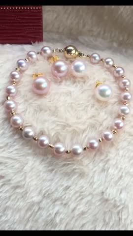 Elegant Pearl Jewelry Set on Soft Fabric Background Close-Up