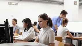 Portrait of smiling caucasian teen schoolgirl in the computer class of the school. High quality 4k footage - Powered by Shutterstock - Get 15% off with code: PIKWIZARD15