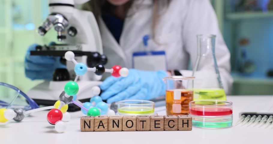A dynamic nanotechnology lab with a powerful microscope and colorful chemical samples for research and experiments