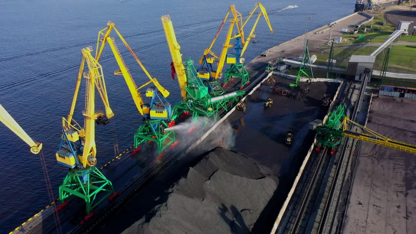 Industrial safety, coal yard is sprayed with water to control dust emissions