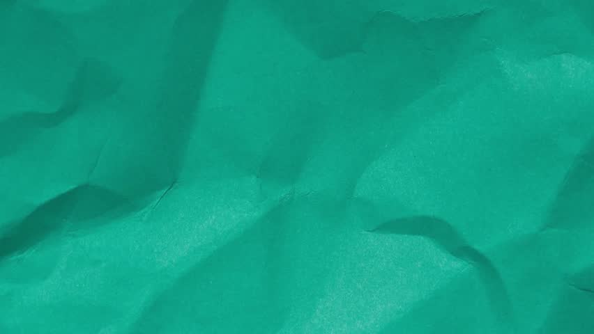 Paper folding stop motion, 4k paper animation, slow motion on green screen, chroma key, folding grunge transition background stop motion animation.