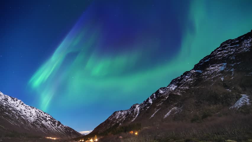 Lofoten Norway time lapse of the aurora borealis northern lights winter landscape at Rorvikstranda