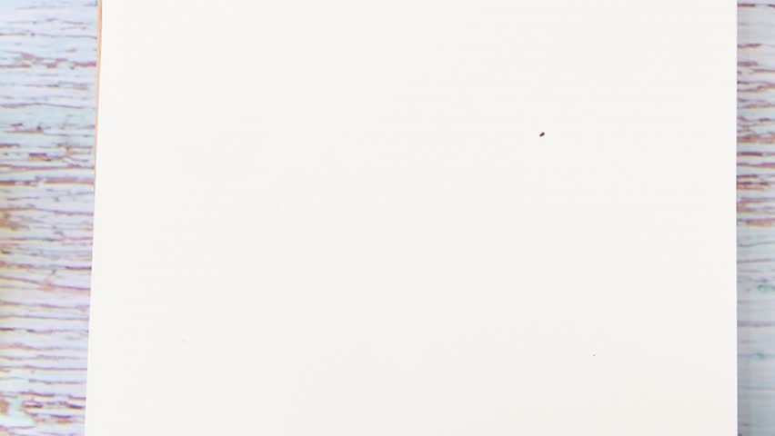 Animated text explains Reflective Practice. Words appear and fade away. The animation presents the Business concept on a light brown wooden surface