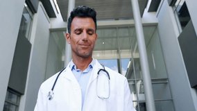 Physician lowering gaze activating medical map overlay grabbing tablet analyzing network nodes. Medical, professional, technology, innovation, cybersecurity, data, connectivity - Powered by Shutterstock - Get 15% off with code: PIKWIZARD15