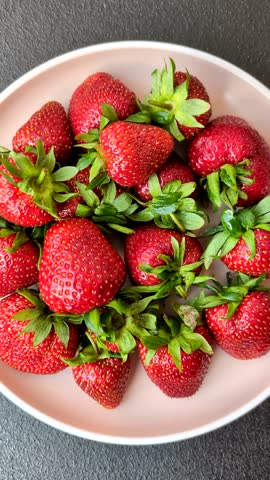 Strawberry, fresh juicy berries and fruits as background. Whole sweet strawberries