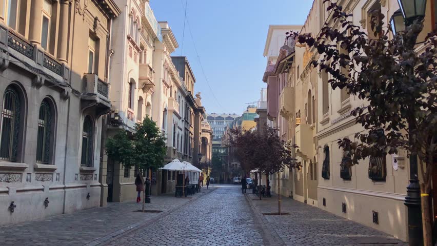 Cobblestone Paris-Londres Street in Santiago, Chile, with historic houses.	