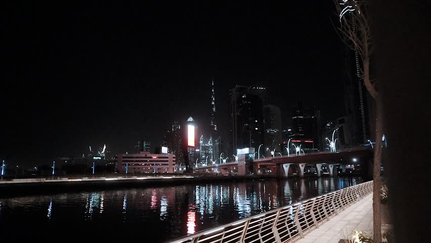 night view of the beautiful city of dubai in the united arab emirates. Downtown and skyscrapers of the business center in the evening. Burj Khalifa. Islamic culture and travel