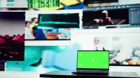 Green screen laptop in front of endless grid of streaming windows displaying mixed media. Mockup notebook and digital interface showing video platform distributing content to global viewers - Powered by Shutterstock - Get 15% off with code: PIKWIZARD15