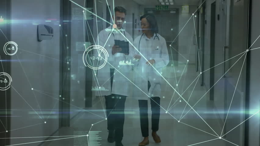 Medical team walking hospital corridor consulting tablet and generating holographic health charts. Futuristic, innovation, collaboration, technology, healthcare, professional, data visualization - Powered by Shutterstock - Get 15% off with code: PIKWIZARD15