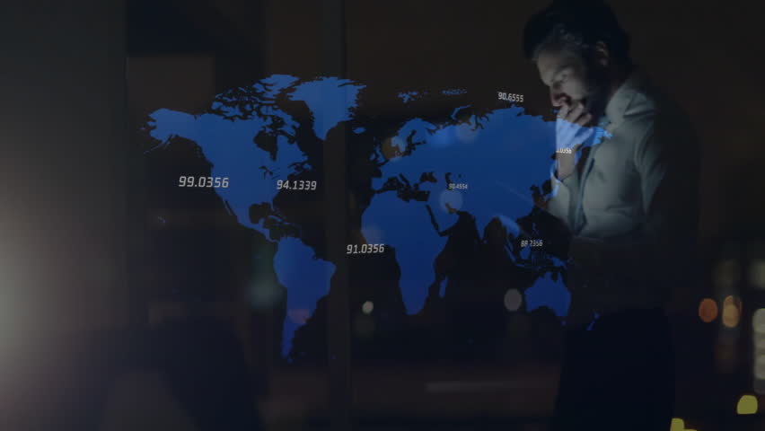 Man raising tablet by glass overlooking city lights, tapping and updating business world map data. Technology, data visualization, digital interface, business intelligence, urban environment, night - Powered by Shutterstock - Get 15% off with code: PIKWIZARD15