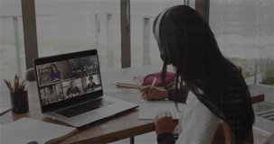 Student with headset writing math while teacher speaking showing waveform on laptop in online class. Virtual learning, education technology, remote instruction, digital classroom, online education, - Powered by Shutterstock - Get 15% off with code: PIKWIZARD15