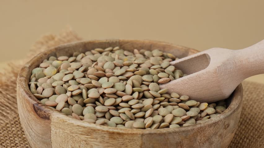 Raw green lentil Gluten free cereals. Health gut benefits. Concept of alternative whole spelt grain ingredient. Vegetarian diet recipes. Plant-based lifestyle. Copy space Protein rich